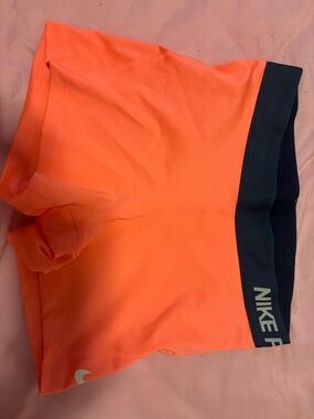 Nike Coral Athletic Shorts with Navy Waistband